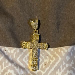 Iced out costume jewelry pendent